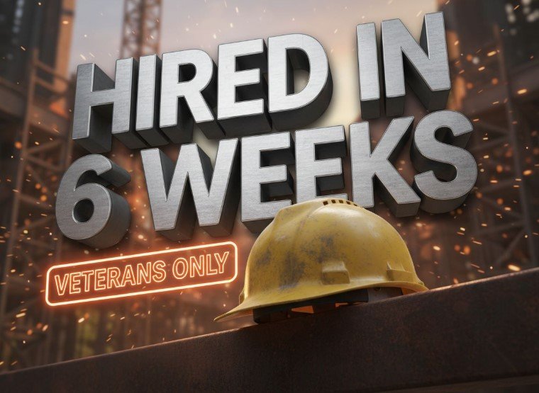 veteran holding construction hard hat with blueprint background