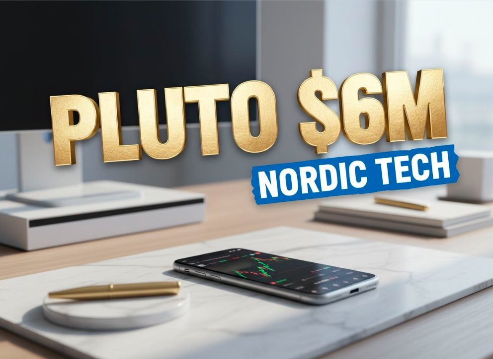 mobile phone displaying stock trading chart on a wooden desk