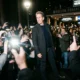 Jerry Seinfeld walking past crowd at NBA Finals game