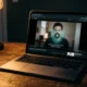 DuckDuckGo browser blocking YouTube ads on a laptop screen