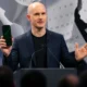 Brian Armstrong Coinbase CEO CLARITY Act delay crypto momentum