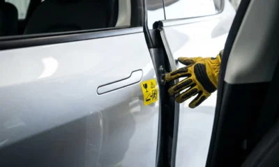 Tesla China door handle recall hidden emergency release risk